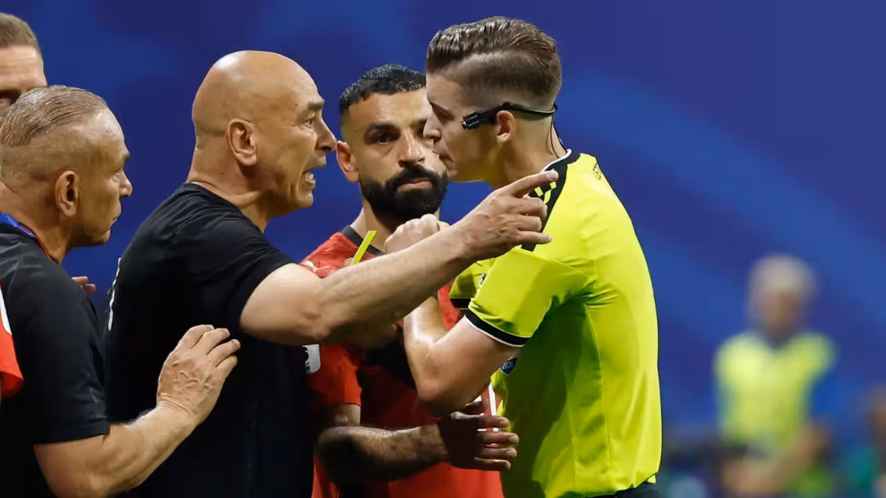 Argentina and Egypt players contest a disputed challenge during their 2026 World Cup match
